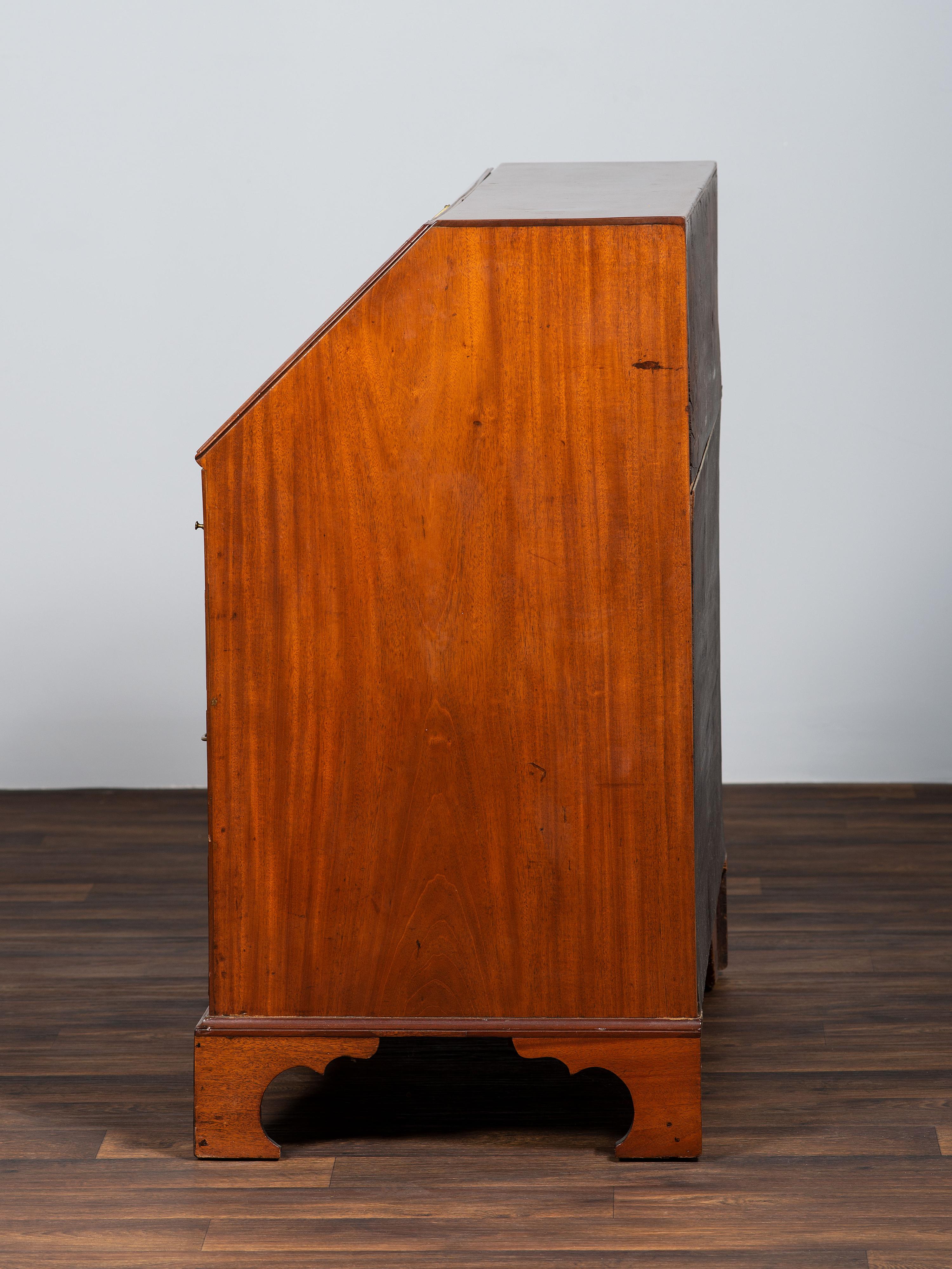 A Chippendale Figured Mahogany Slant-Front Desk