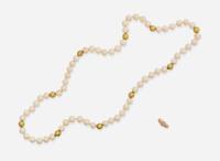 An 18K Yellow Gold and Coral Necklace and Matching Ring
