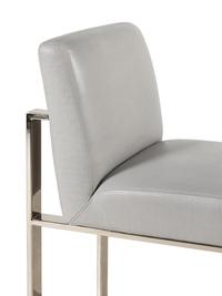 A Set of Four Contemporary Leather-Upholstered Chairs