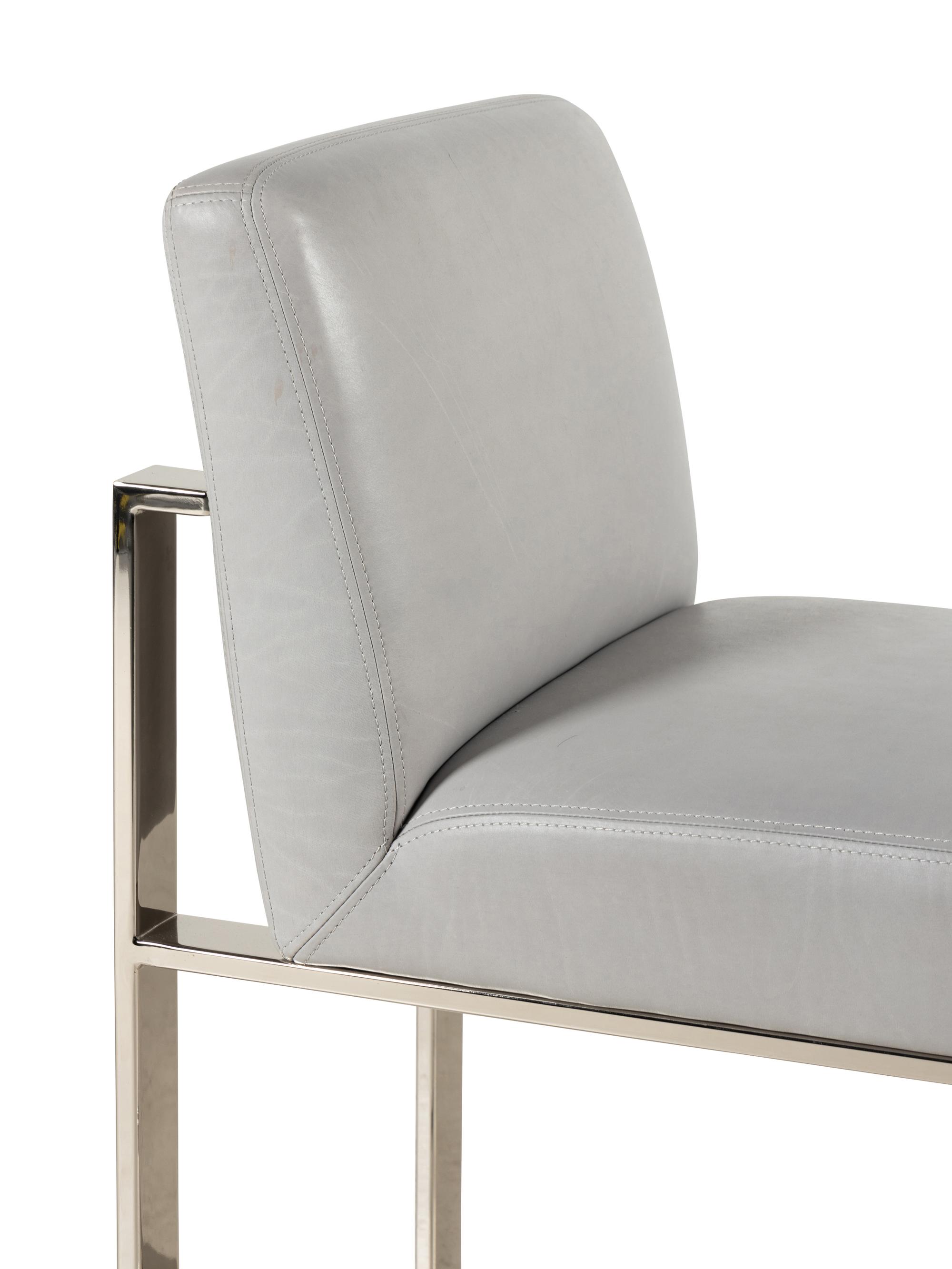 A Set of Four Contemporary Leather-Upholstered Chairs
