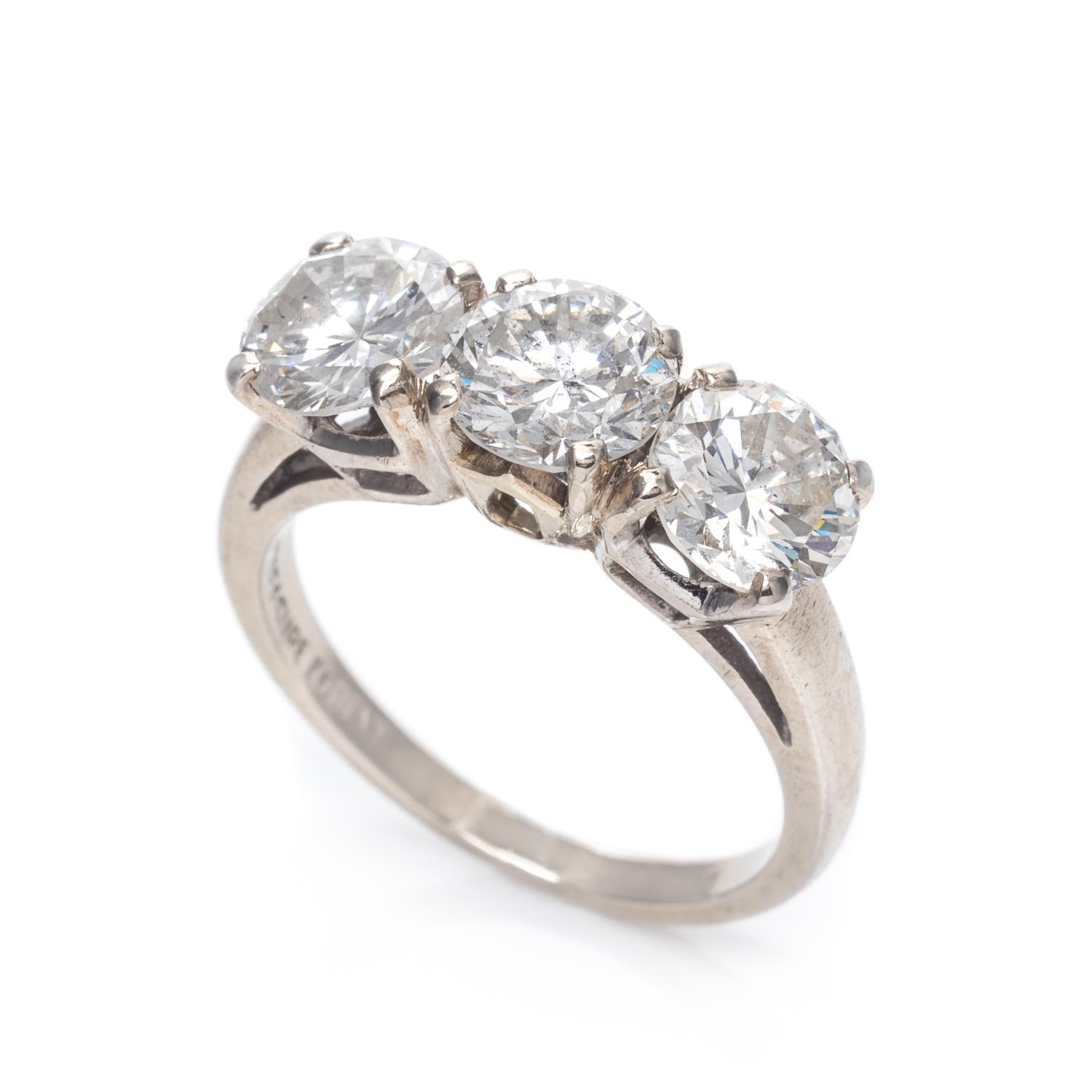 A 14 Karat White Gold and Diamond Ring,