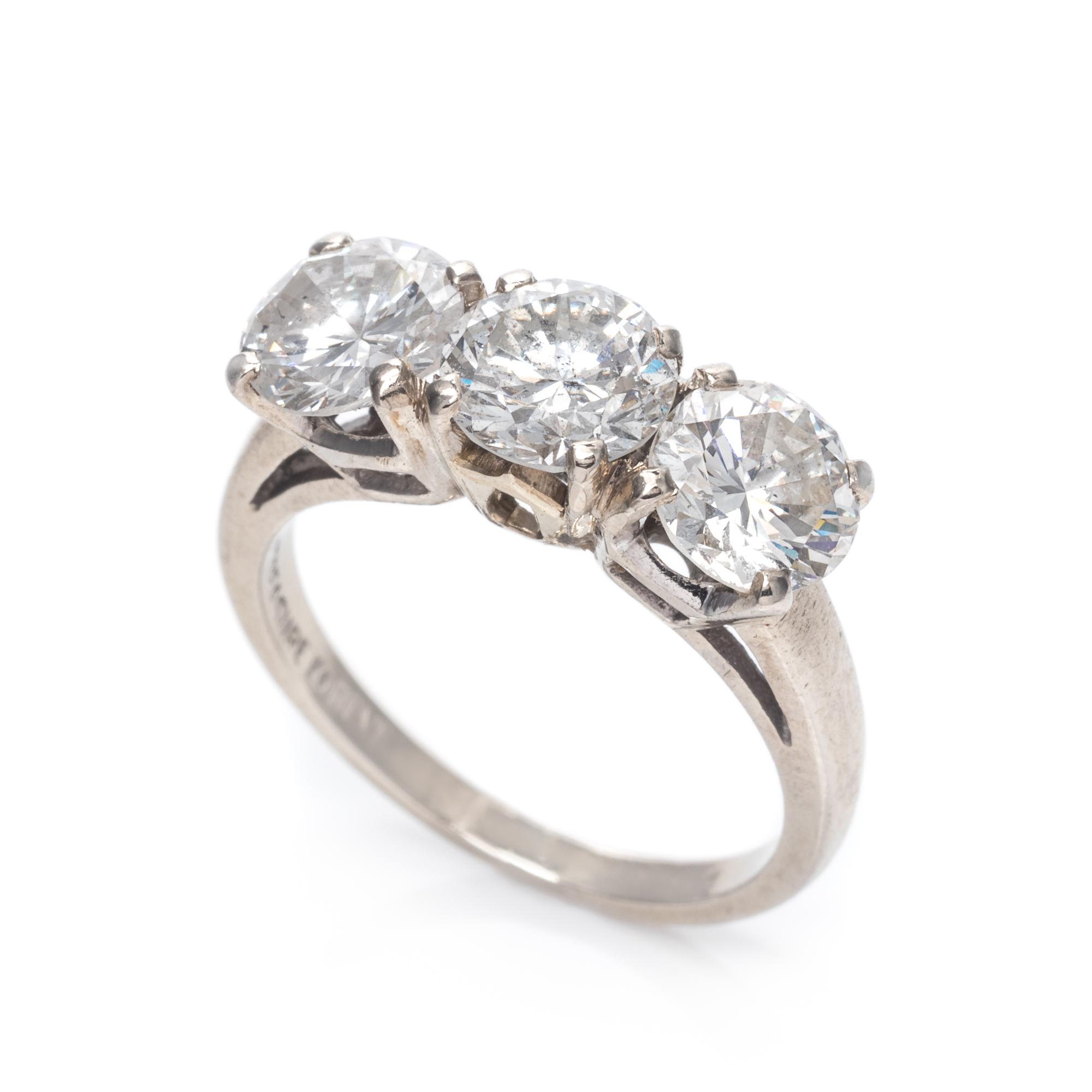 A 14 Karat White Gold and Diamond Ring,