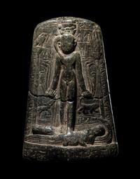 An Egyptian Black Stone Cippus of Horus