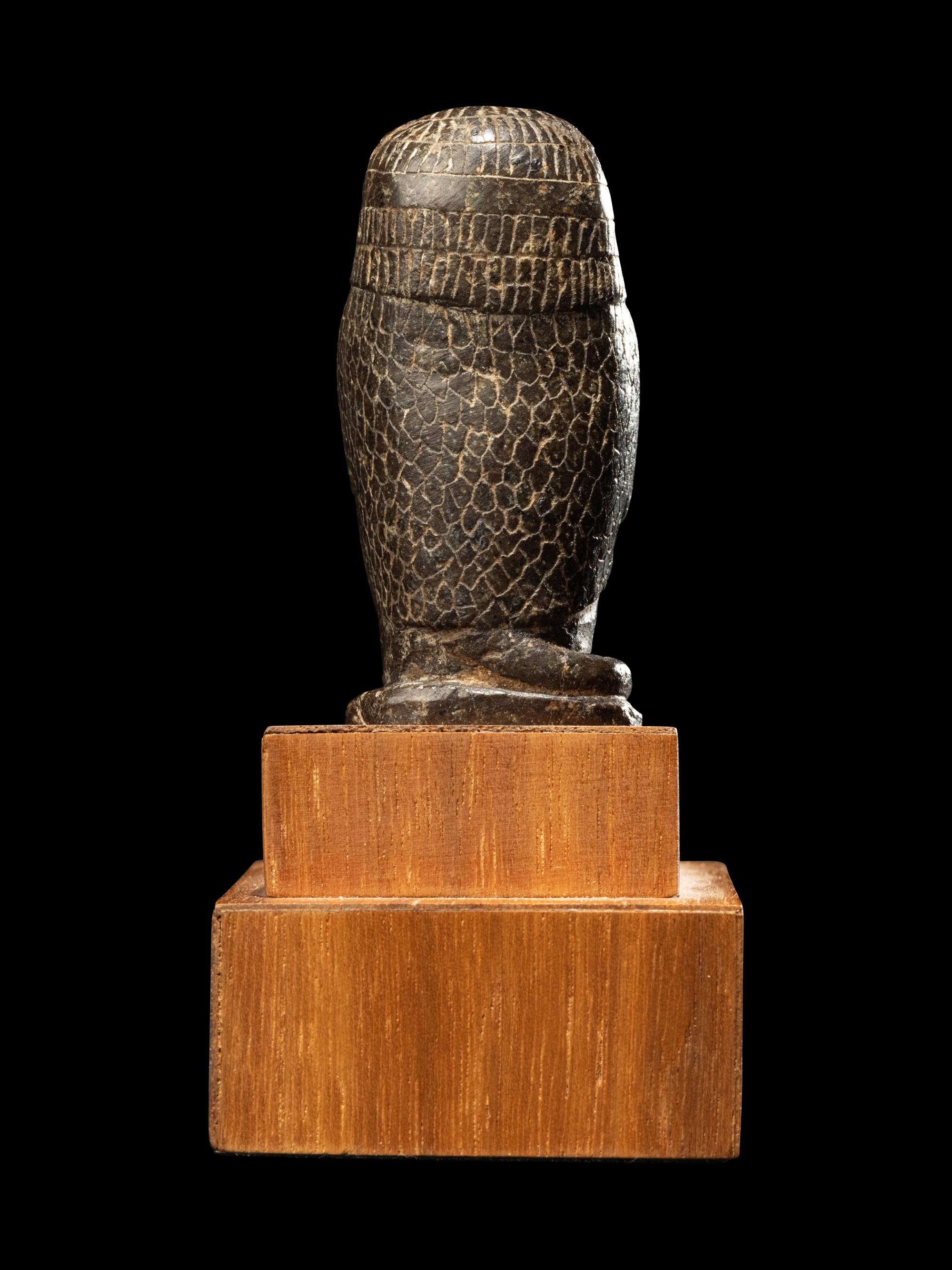 An Egyptian Serpentine Baboon