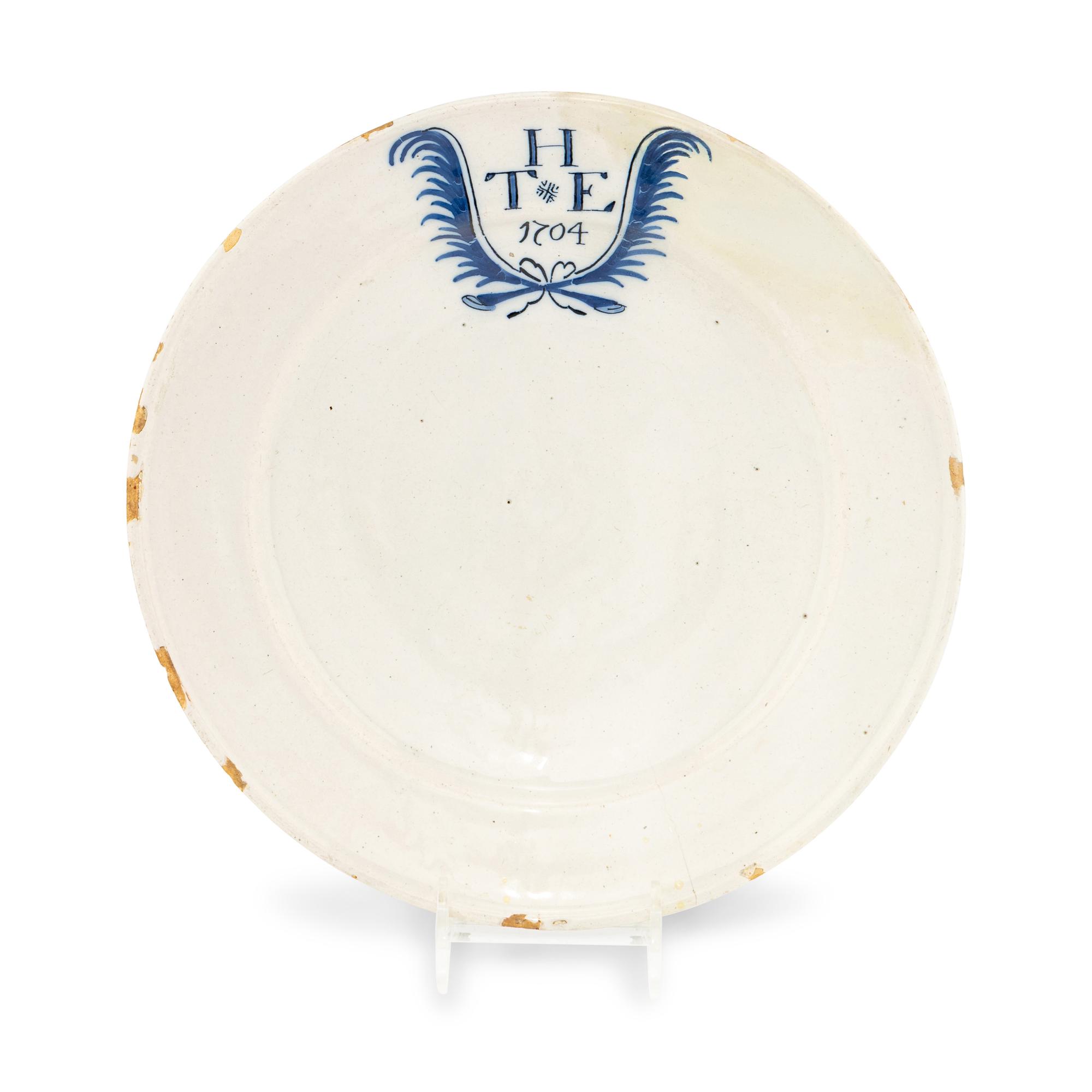 An English Delftware ' Marriage' Plate