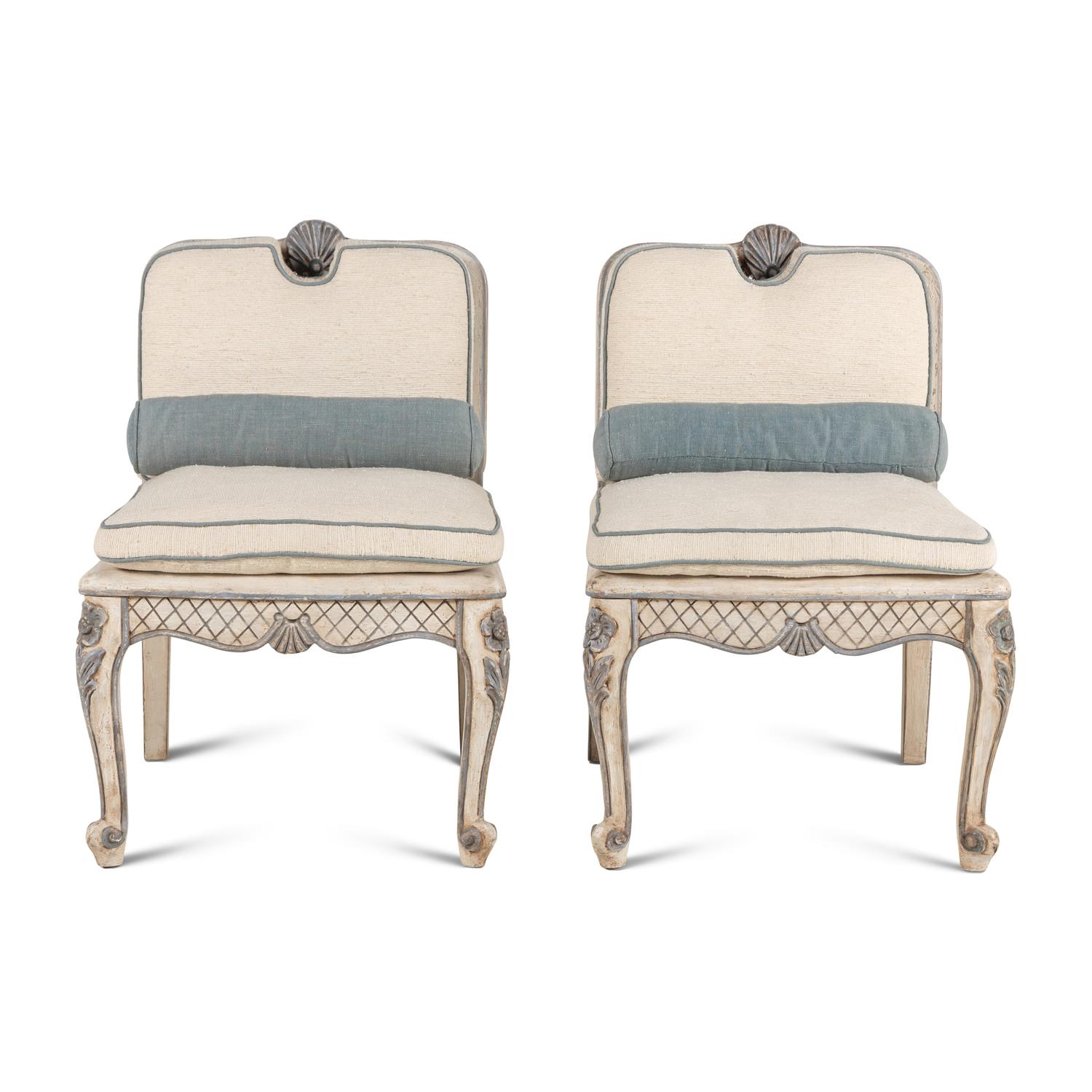 A Pair of Italian Painted and Caned Side Chairs