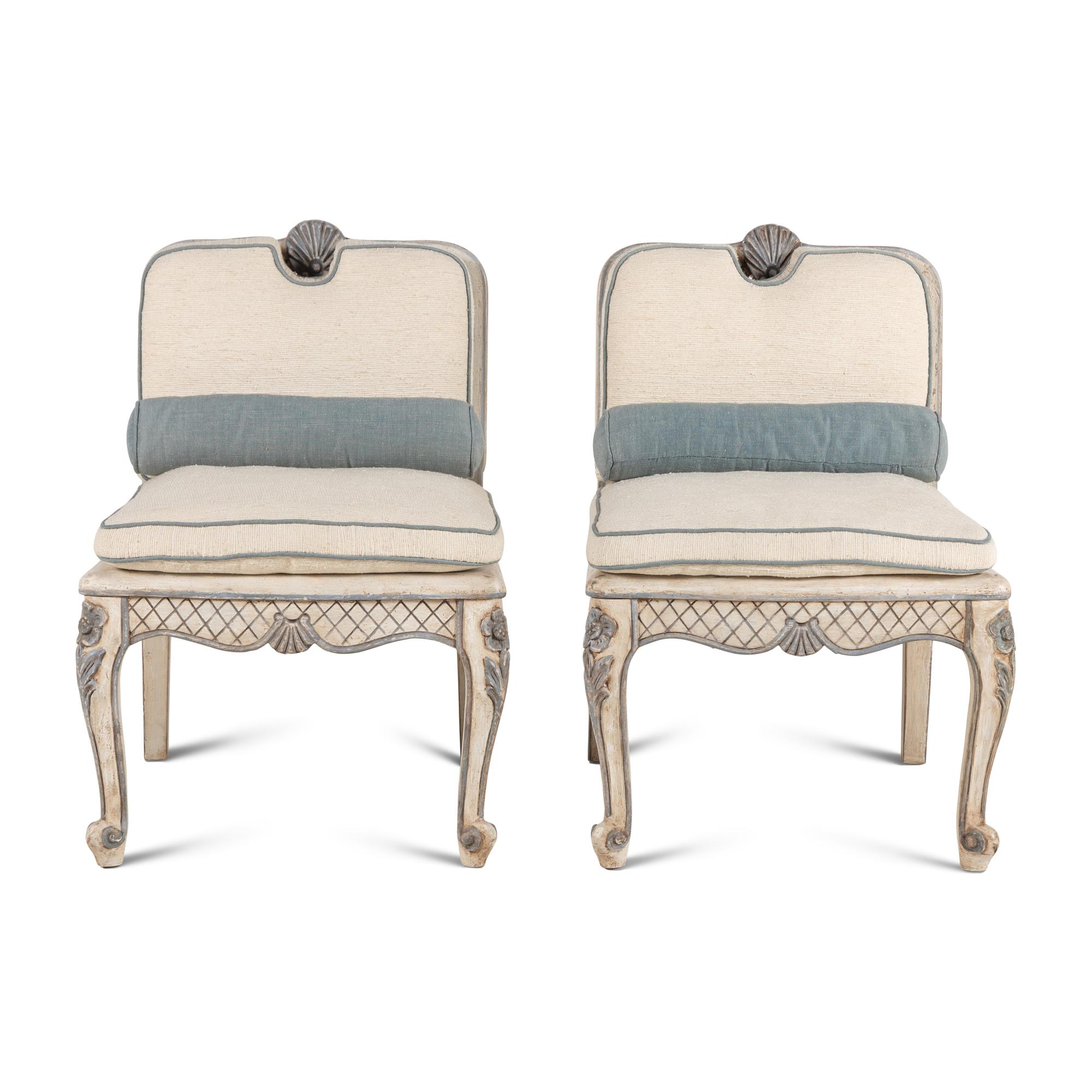 A Pair of Italian Painted and Caned Side Chairs