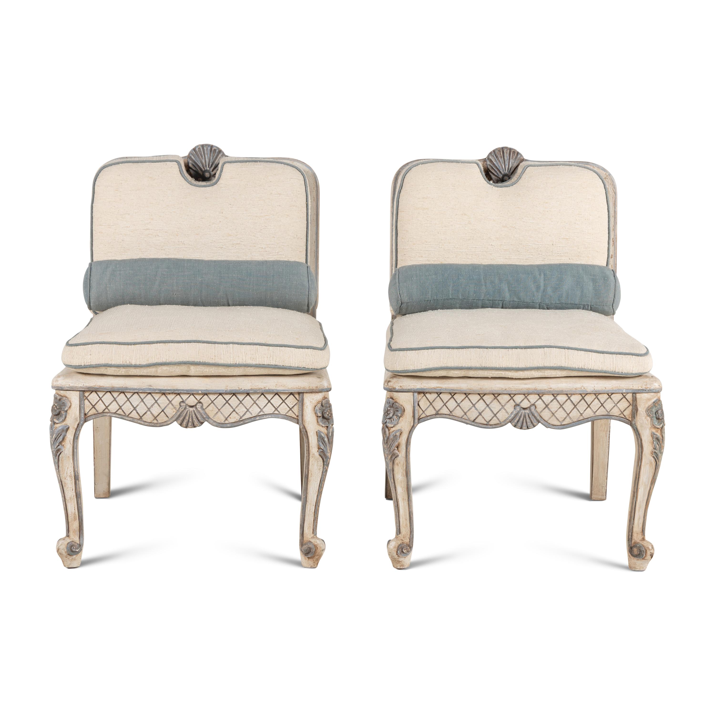 A Pair of Italian Painted and Caned Side Chairs