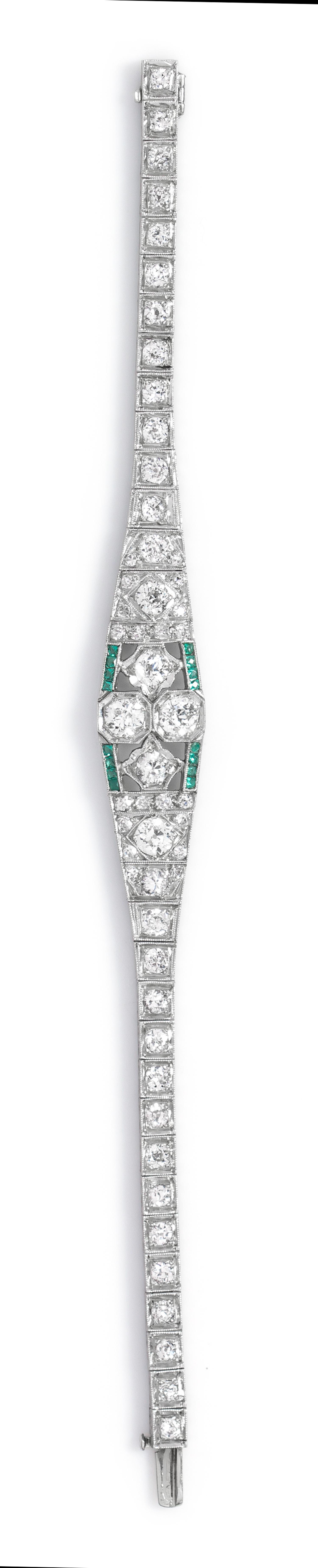 An Art Deco Platinum, Diamond and Simulated Emerald Bracelet, 12.20 dwts.