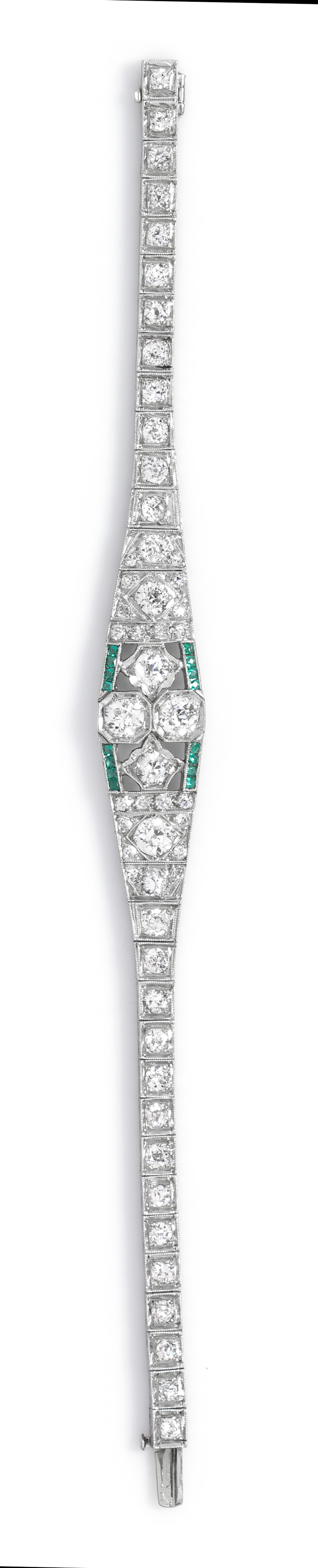 An Art Deco Platinum, Diamond and Simulated Emerald Bracelet, 12.20 dwts.