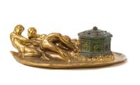 A Tiffany Studios Jeweled Gilt Bronze Figural Inkwell Length 10 1/8 inches. — CIRCA 1905
