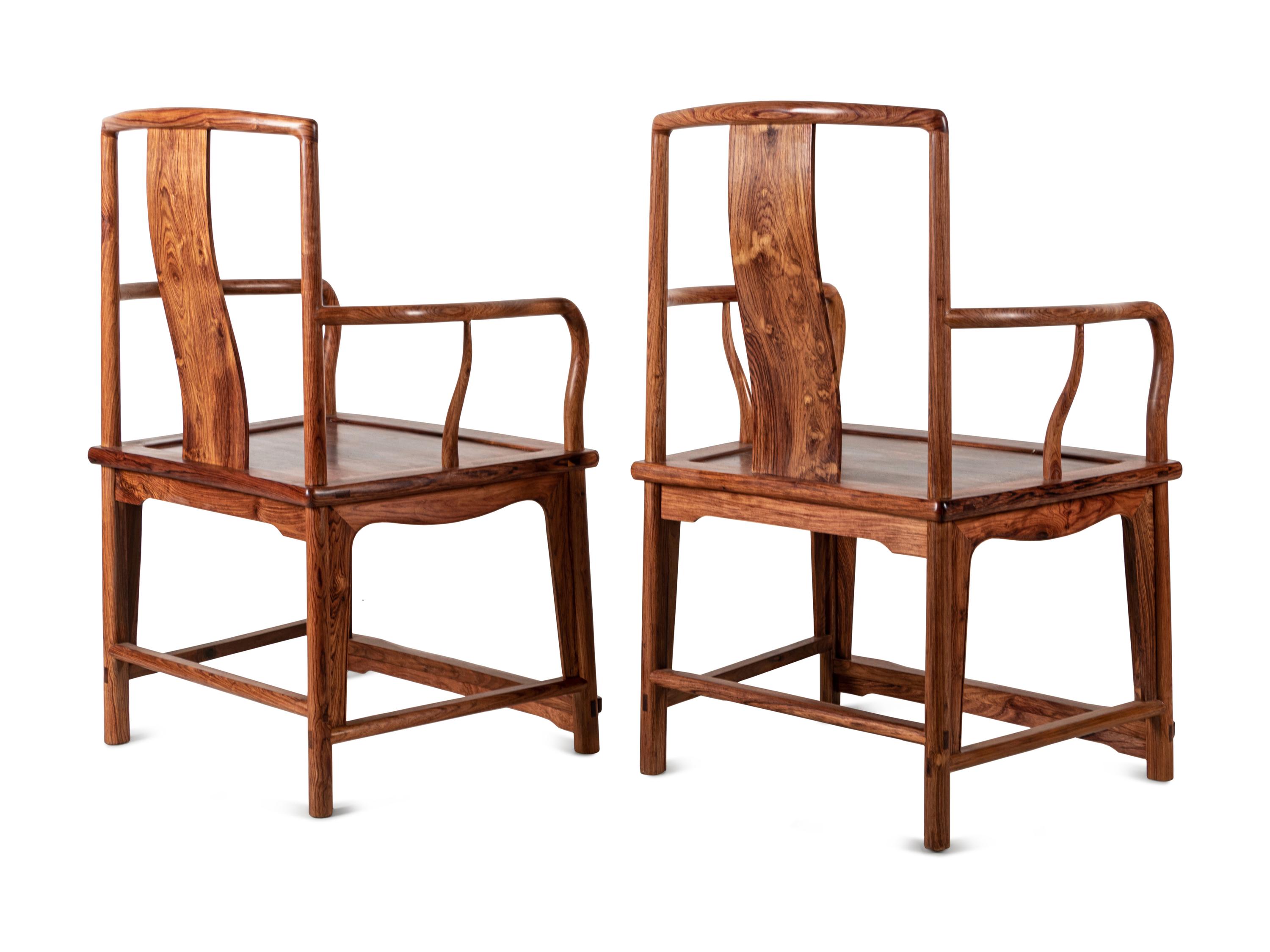 A Set of Chinese Huanghuali Armchairs and Side Table, Nanguanmaoyi