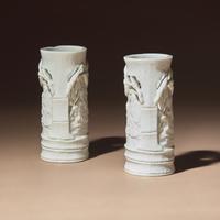 A Pair of Chinese Blanc-de-Chine Reticulated Porcelain 'Scholars' Brush Pots, Bitong, 17th-18th Century — 清早期 德化白瓷鏤雕竹林七賢筆筒一對