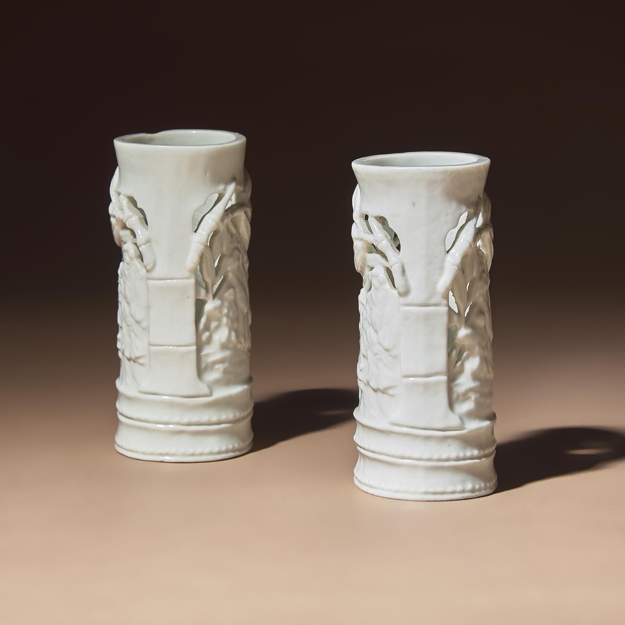 A Pair of Chinese Blanc-de-Chine Reticulated Porcelain 'Scholars' Brush Pots, Bitong, 17th-18th Century — 清早期 德化白瓷鏤雕竹林七賢筆筒一對
