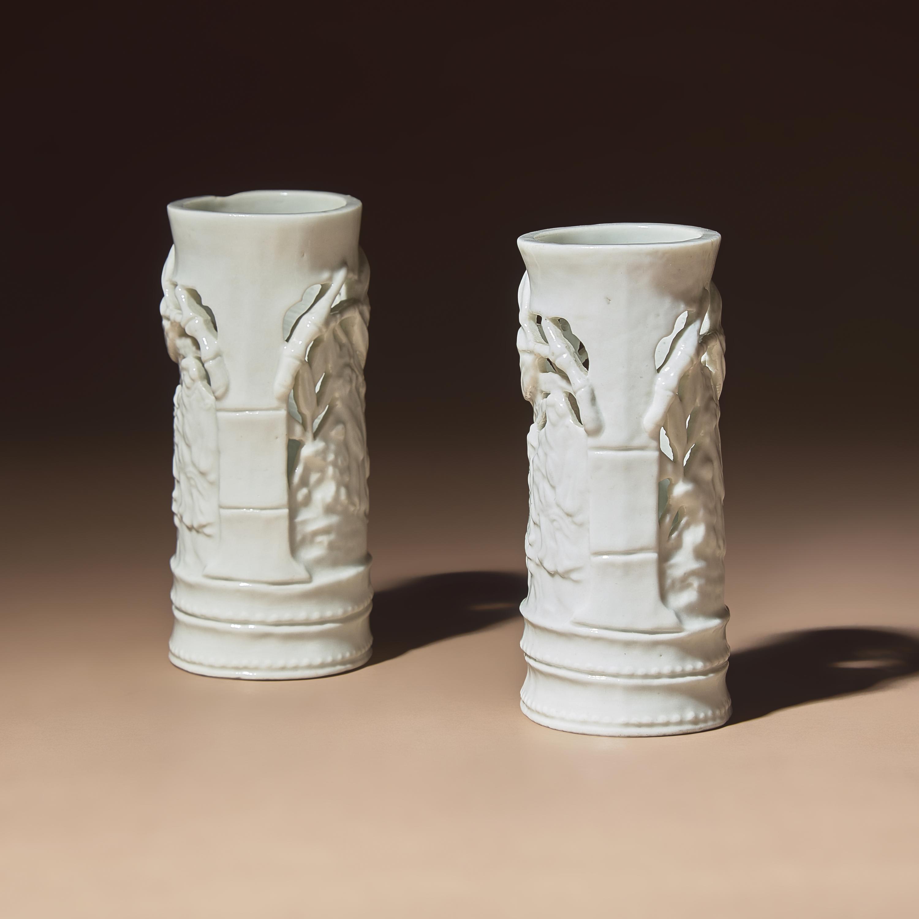 A Pair of Chinese Blanc-de-Chine Reticulated Porcelain 'Scholars' Brush Pots, Bitong, 17th-18th Century — 清早期 德化白瓷鏤雕竹林七賢筆筒一對