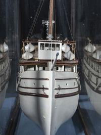 A Painted Wood Cased Steamboat Model