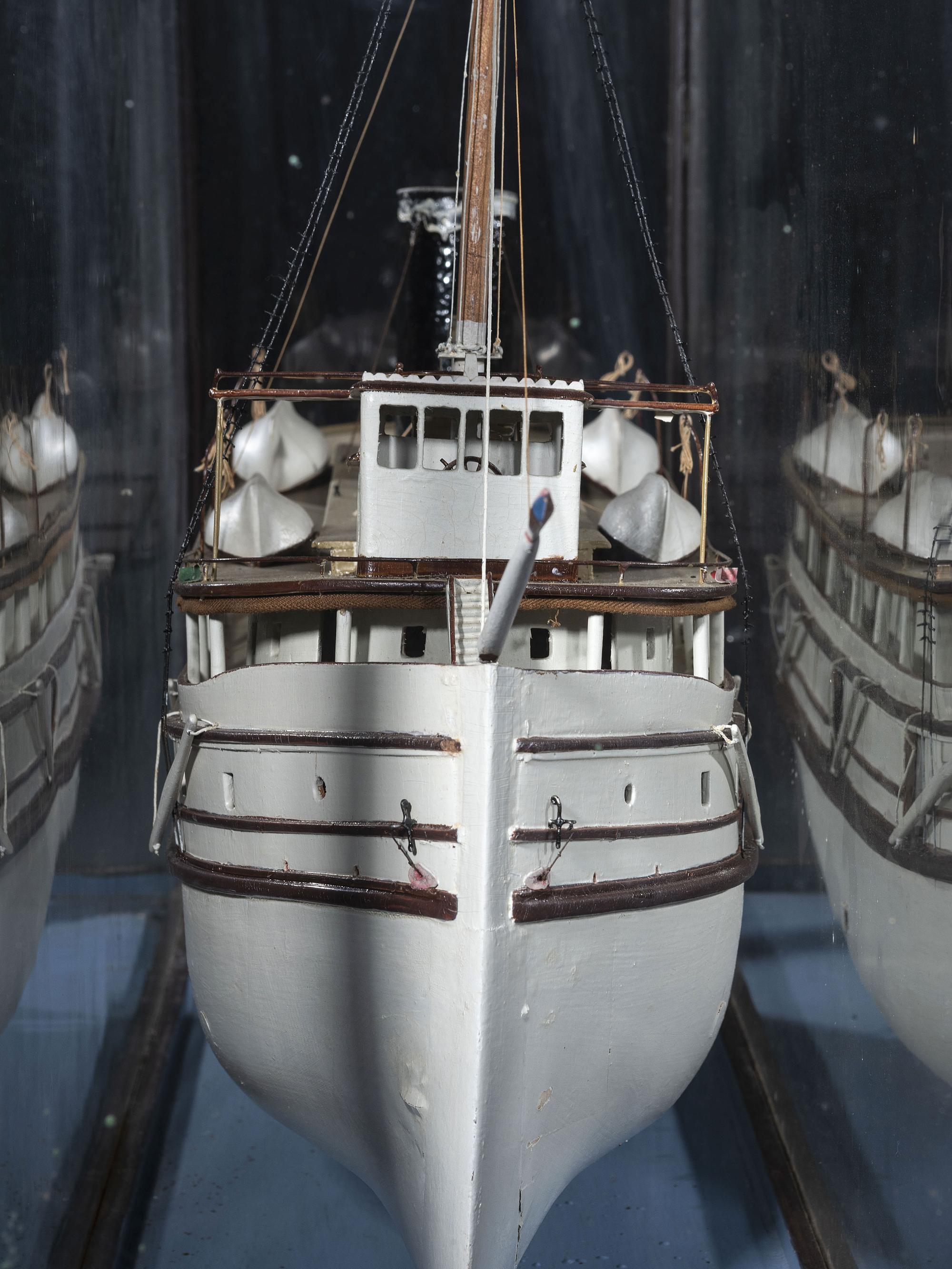 A Painted Wood Cased Steamboat Model
