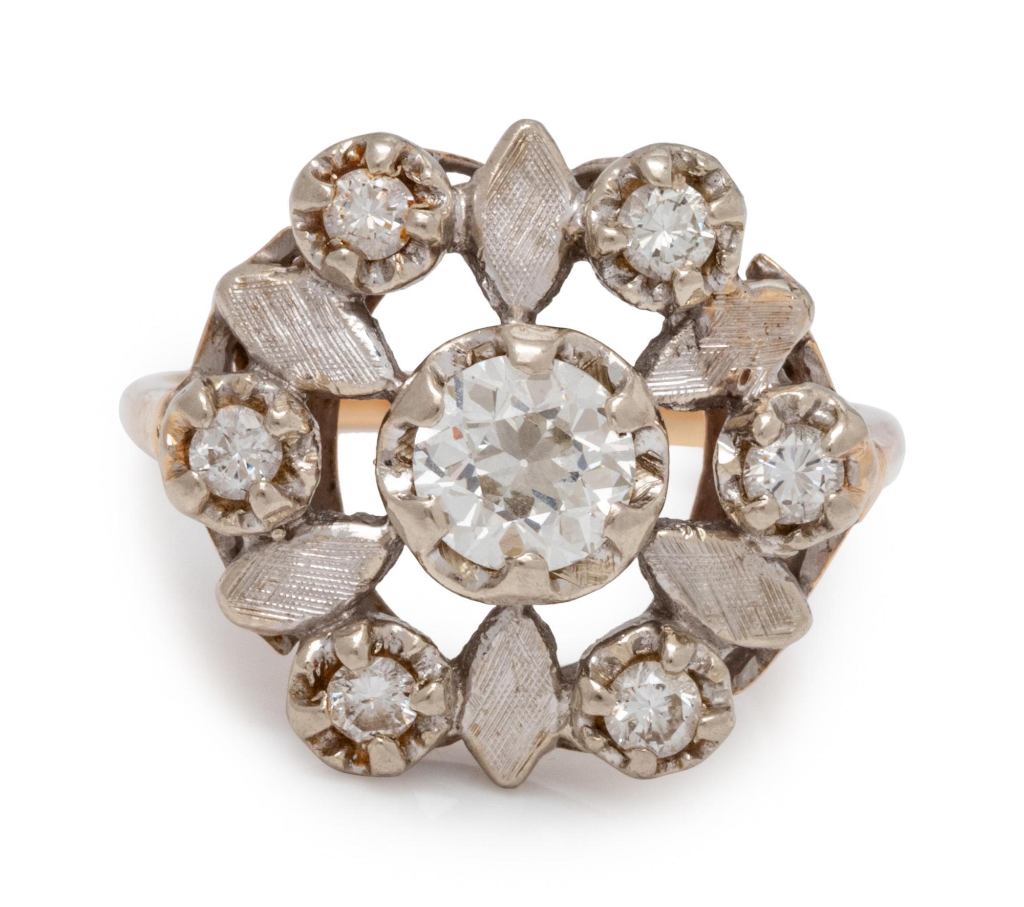 A 14 Karat Bicolor Gold and Diamond Ring,