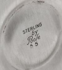 An American Silver Ice Bucket, Poole Silver Co., Taunton, NY, Mid-20th Century, the domed lid with an urn form finial, the twin-handled