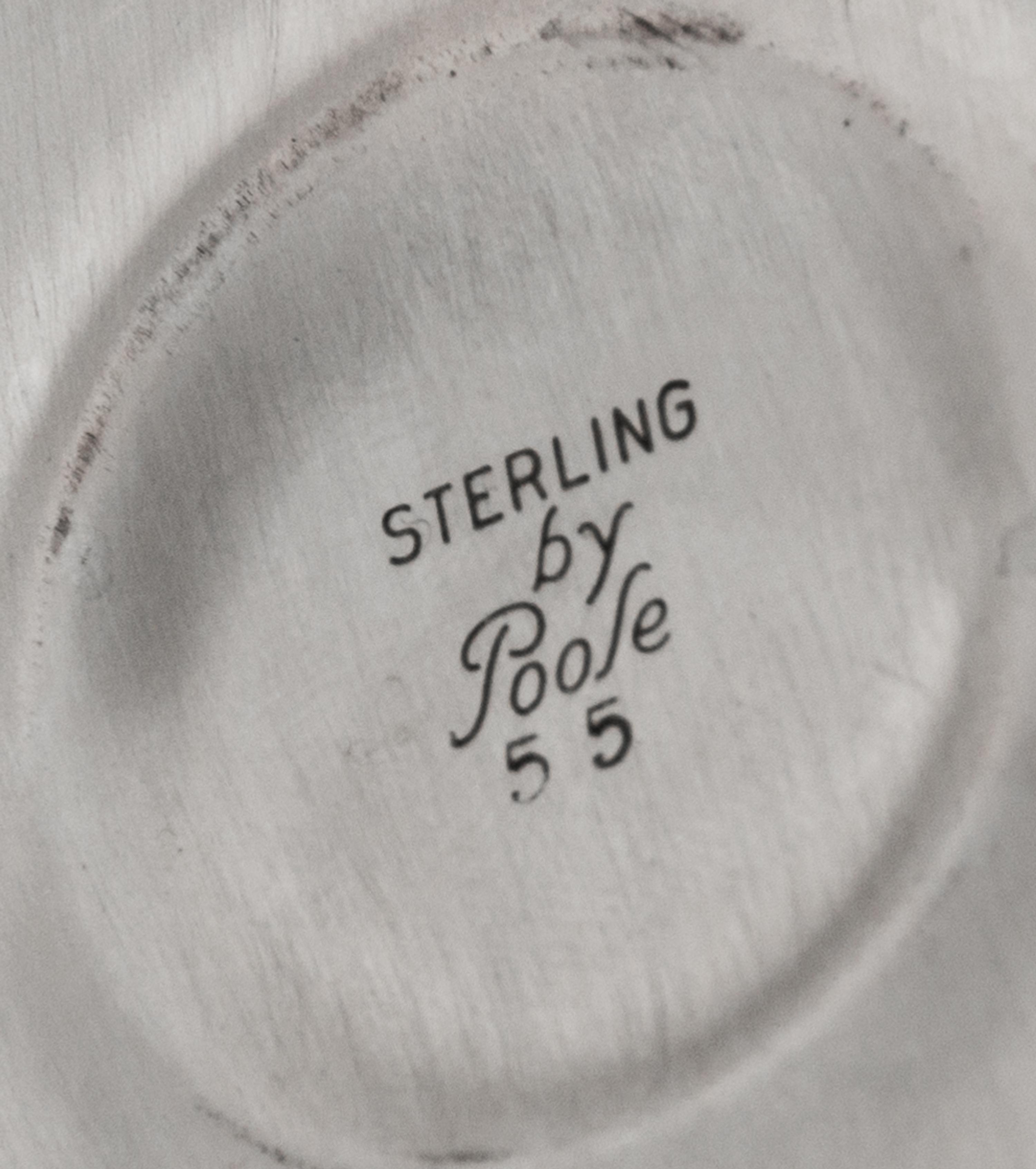 An American Silver Ice Bucket, Poole Silver Co., Taunton, NY, Mid-20th Century, the domed lid with an urn form finial, the twin-handled