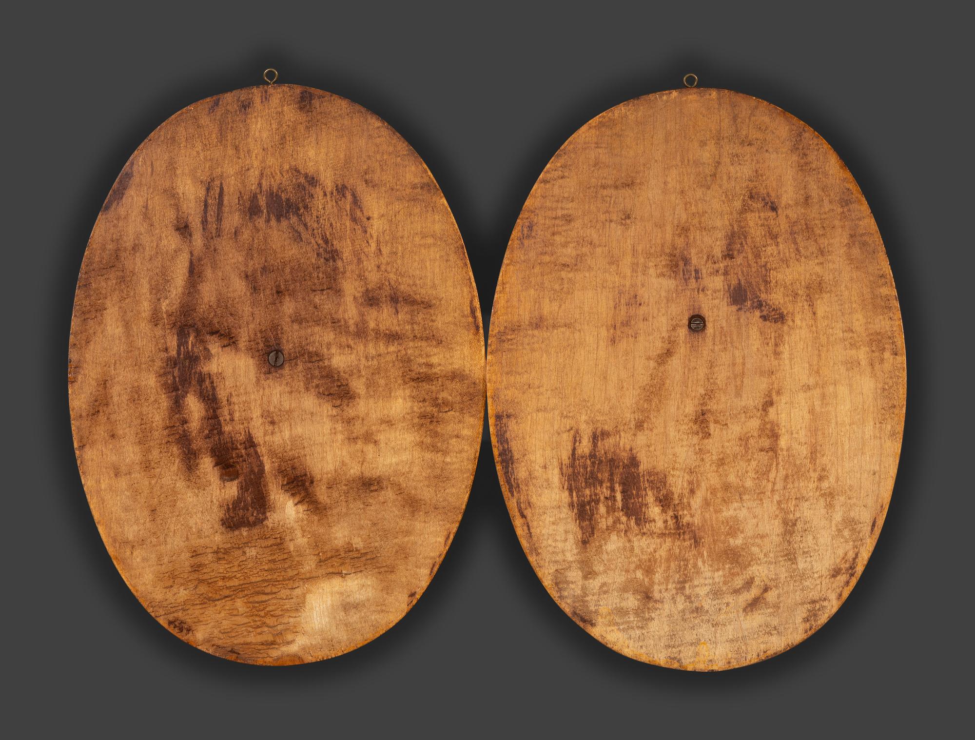 A Pair of Black Forest Style Carved Wood Game Plaques