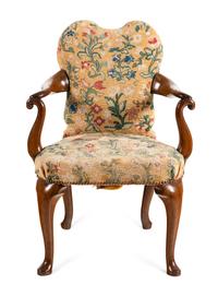 A George I Walnut and Needlework Upholstered Armchair