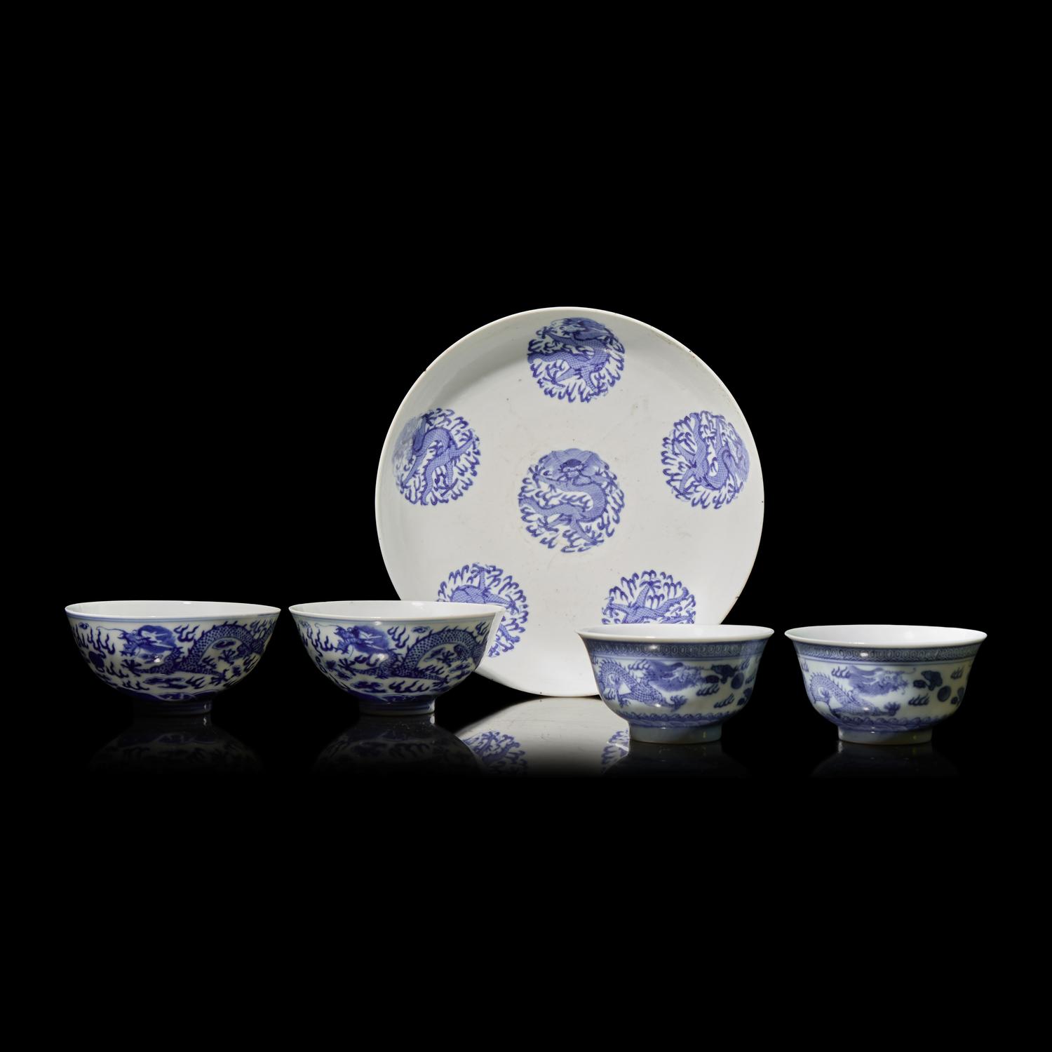 A Group of Five Assorted Chinese Blue and White "Dragons" Cups and Bowls, 19th-20th Century — 青花云龍紋碗盤一組五件