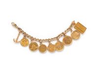YELLOW GOLD AND COIN CHARM BRACELET