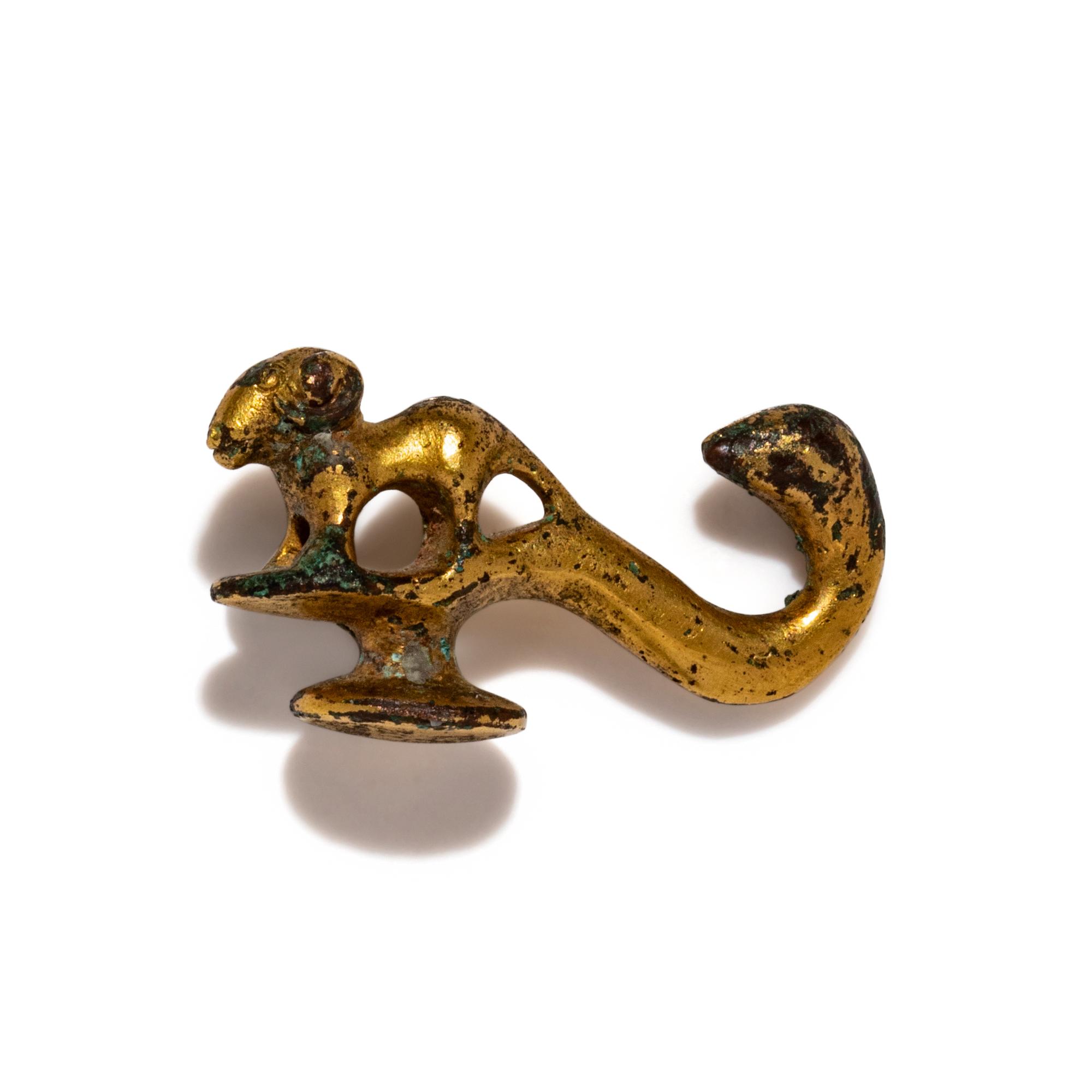 A Chinese Gilt-Bronze 'Ram' Belt Hook, Han Dynasty 漢 銅鎏金羊首帶鈎