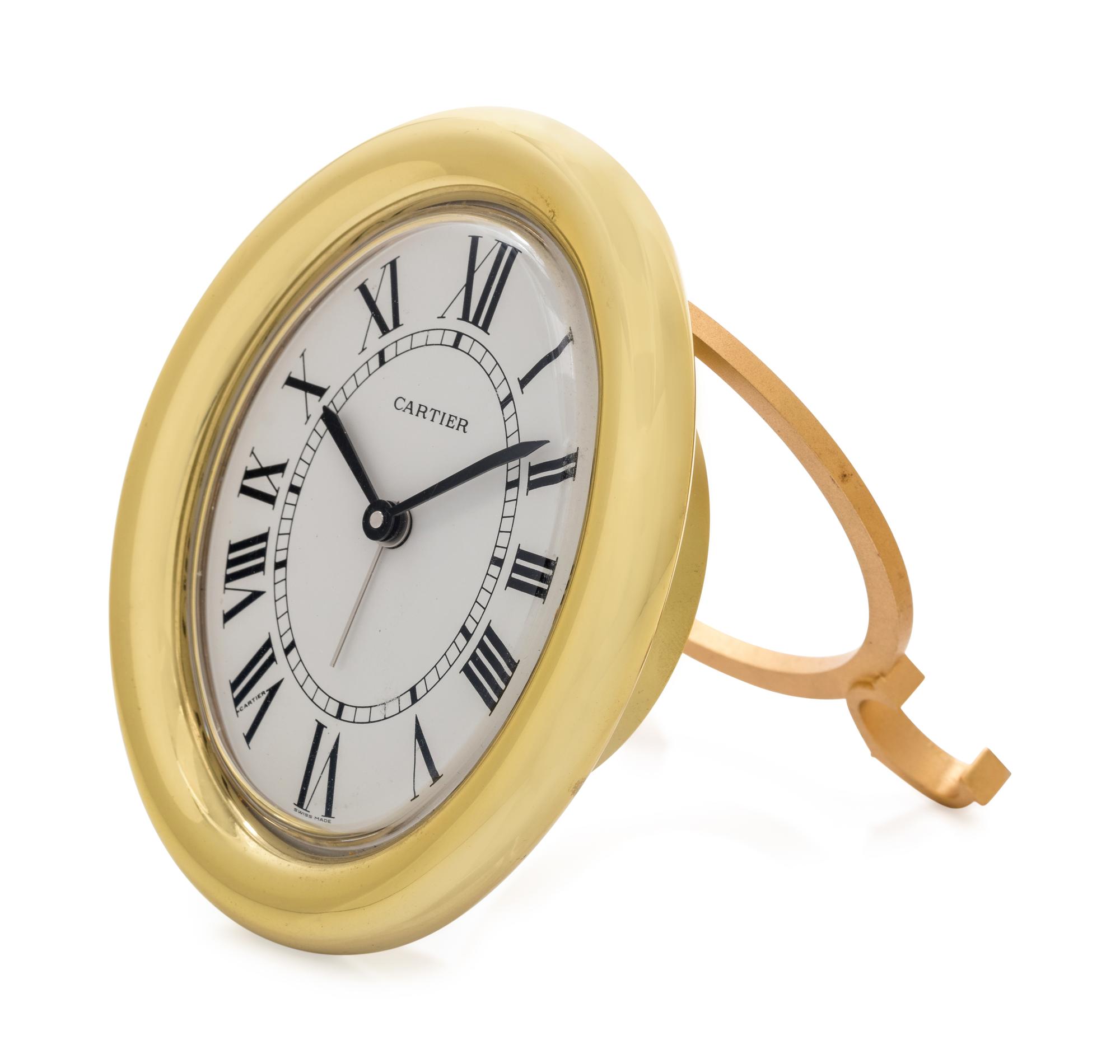 CARTIER, GOLD-PLATED 'BAIGNOIRE' ALARM TABLE CLOCK — 185.00 dwt.
