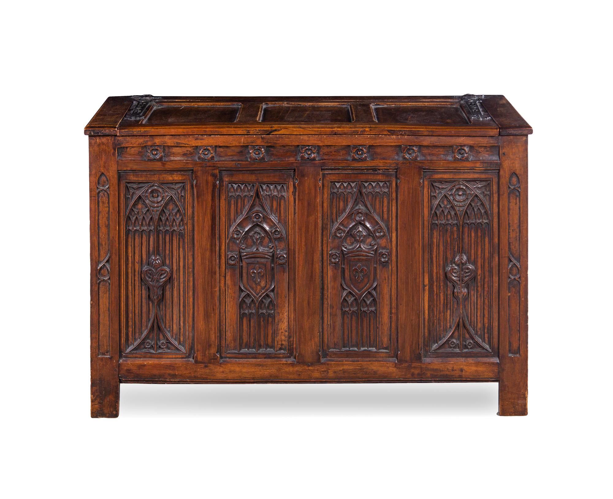 A Gothic Style Carved Walnut Chest