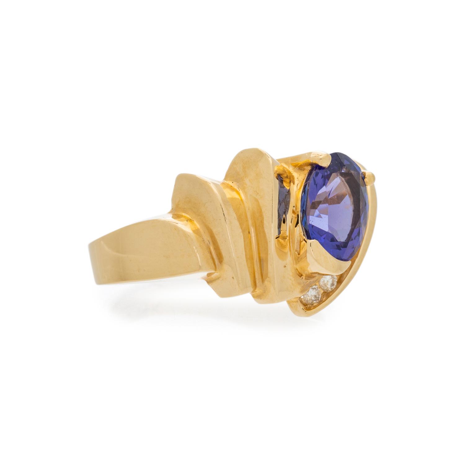 YELLOW GOLD, TANZANITE AND DIAMOND RING