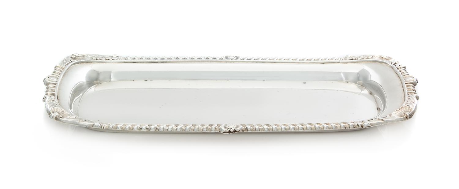 A George III Silver Bread Tray, W. Tucker & Co., Sheffield, 1809, of rectangular form with rounded corners, the gadroon rim worked to s