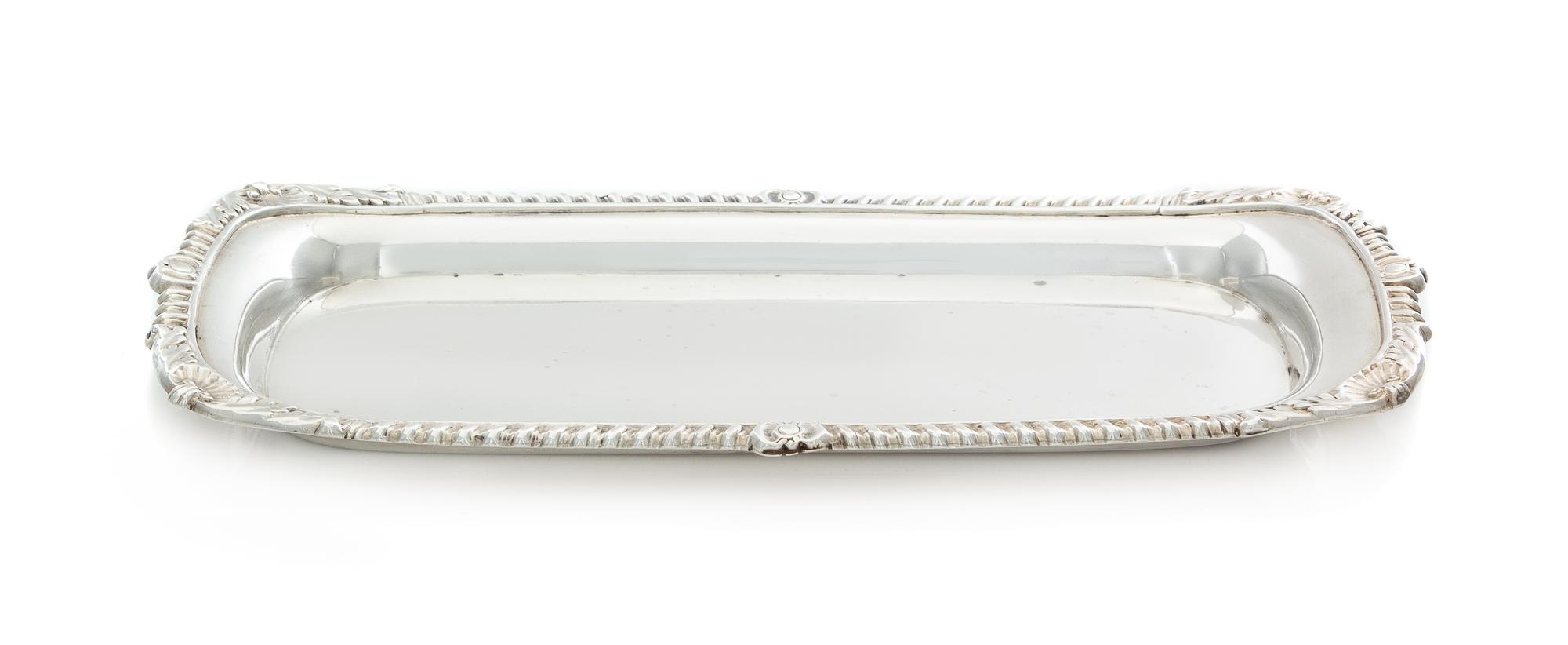 A George III Silver Bread Tray, W. Tucker & Co., Sheffield, 1809, of rectangular form with rounded corners, the gadroon rim worked to s