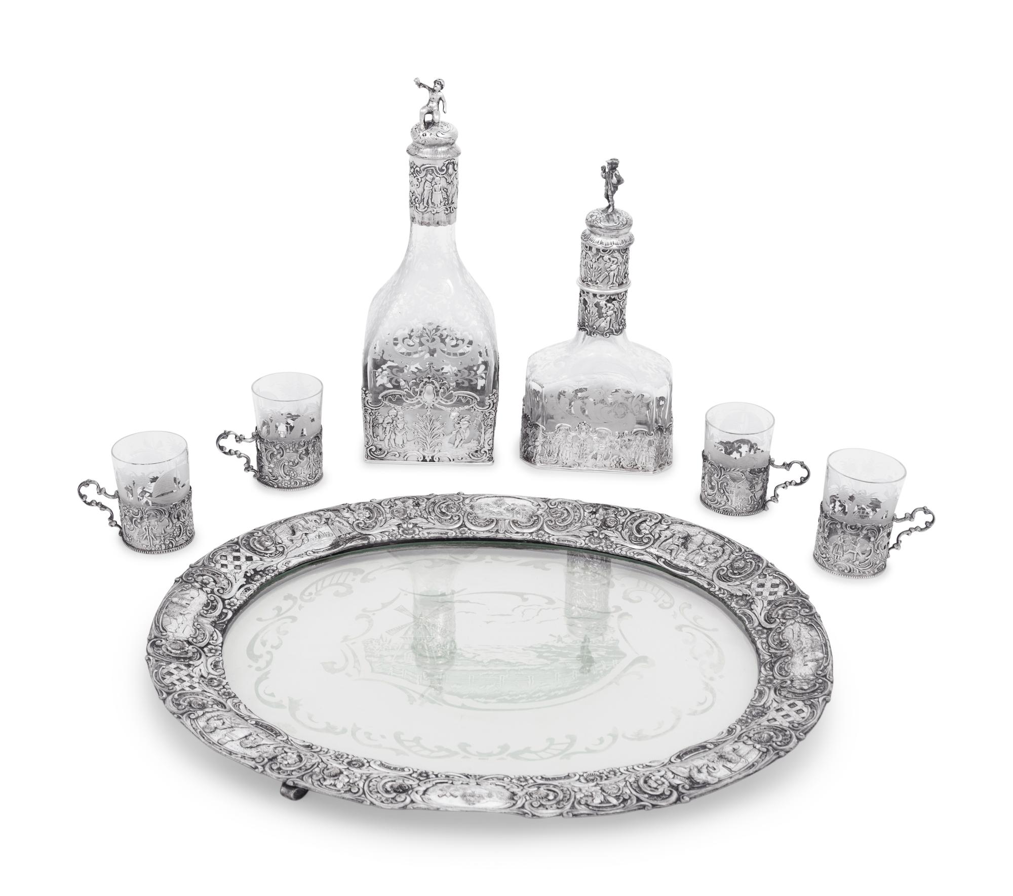 A Continental Silver Mounted Etched Glass Drink Service