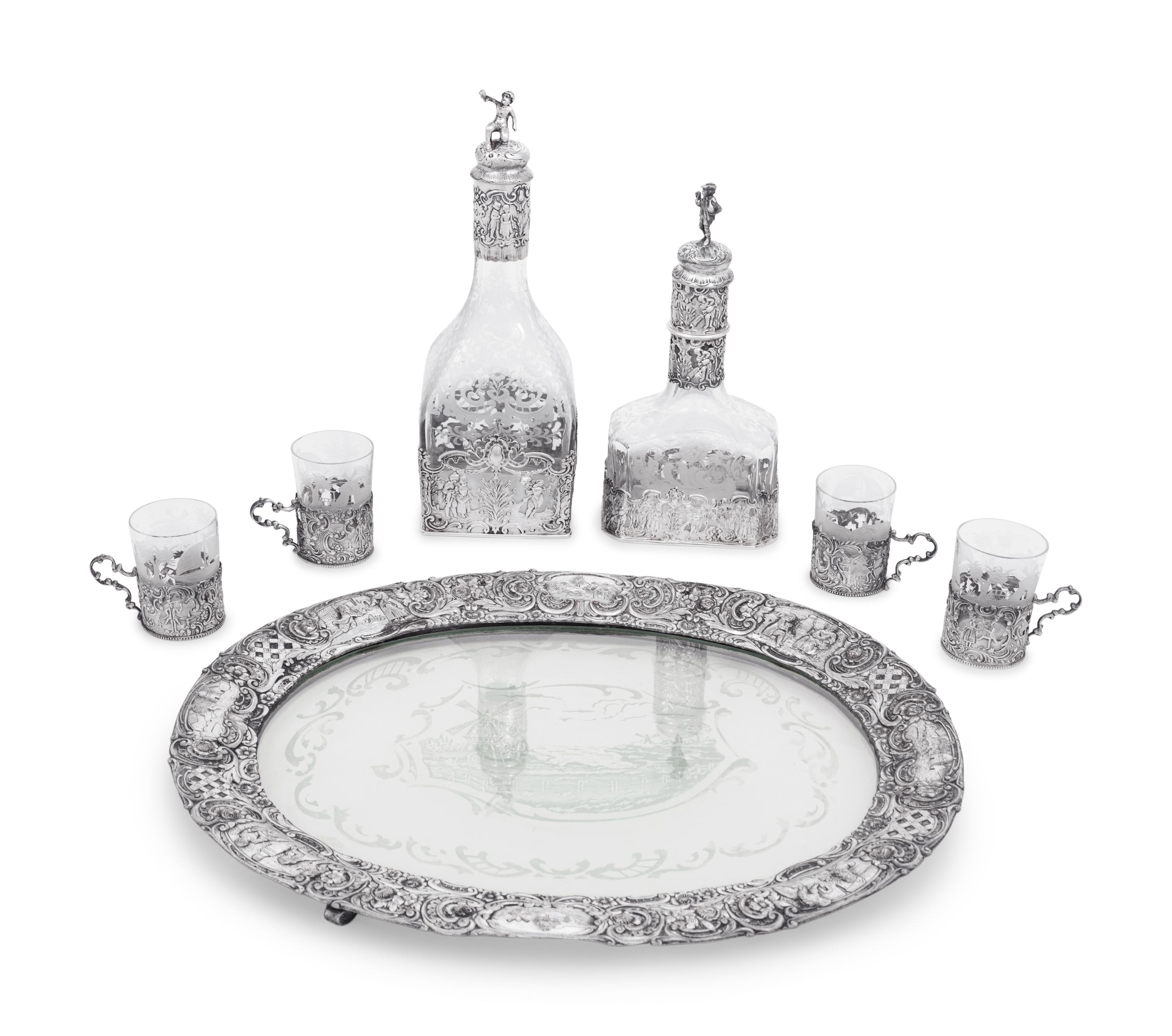 A Continental Silver Mounted Etched Glass Drink Service