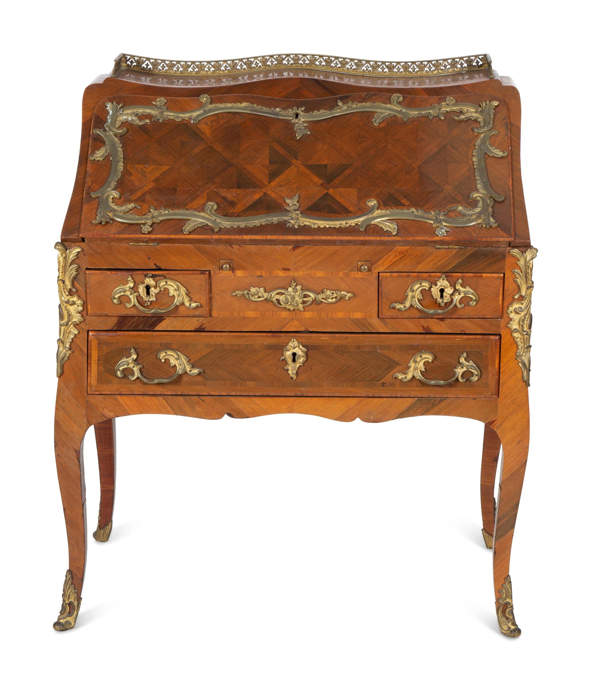 A Louis XV Style Parquetry Inlaid Writing Desk with Brass Gallery