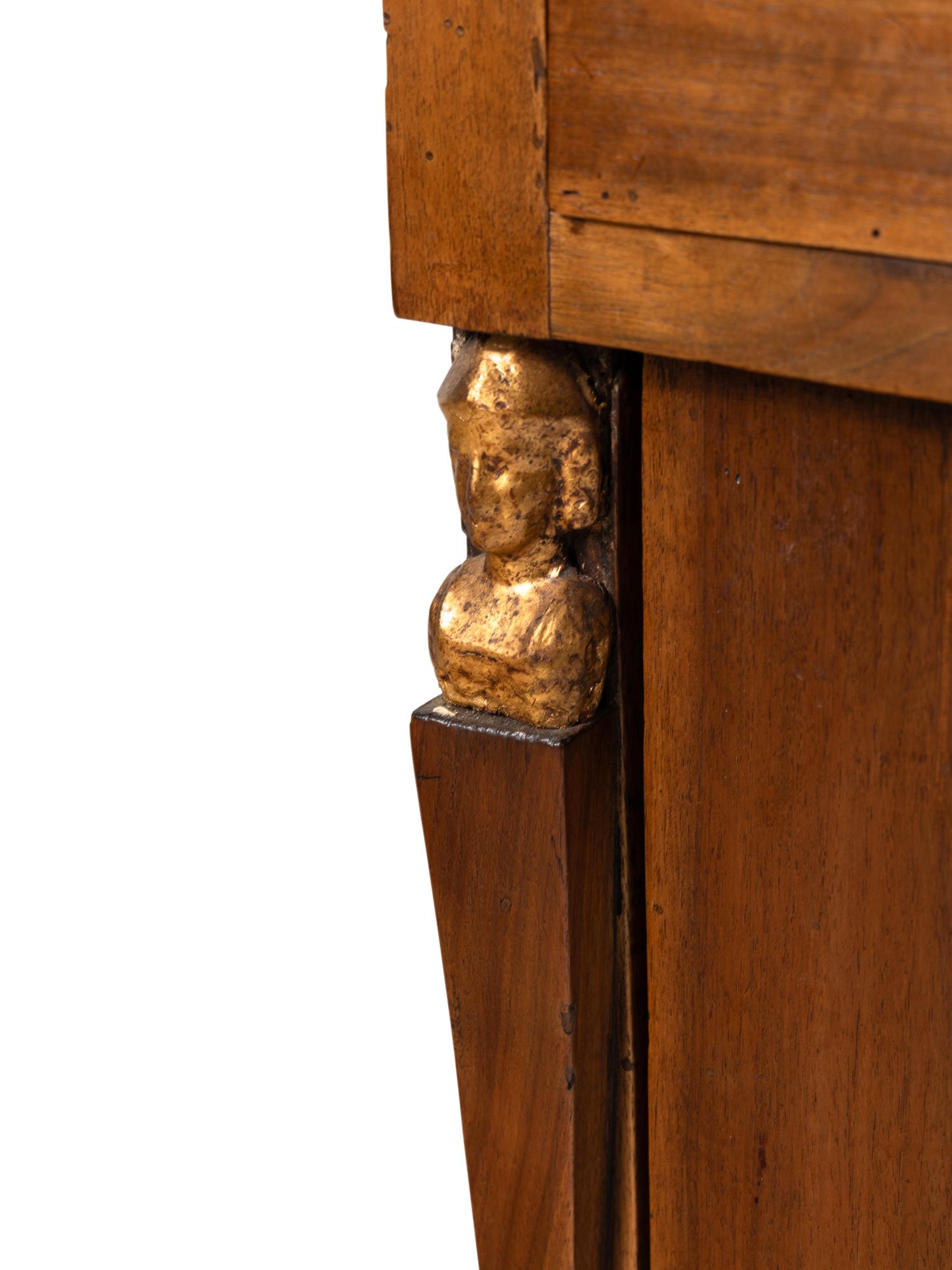 A Pair of Italian Walnut and Parcel Gilt Commodini