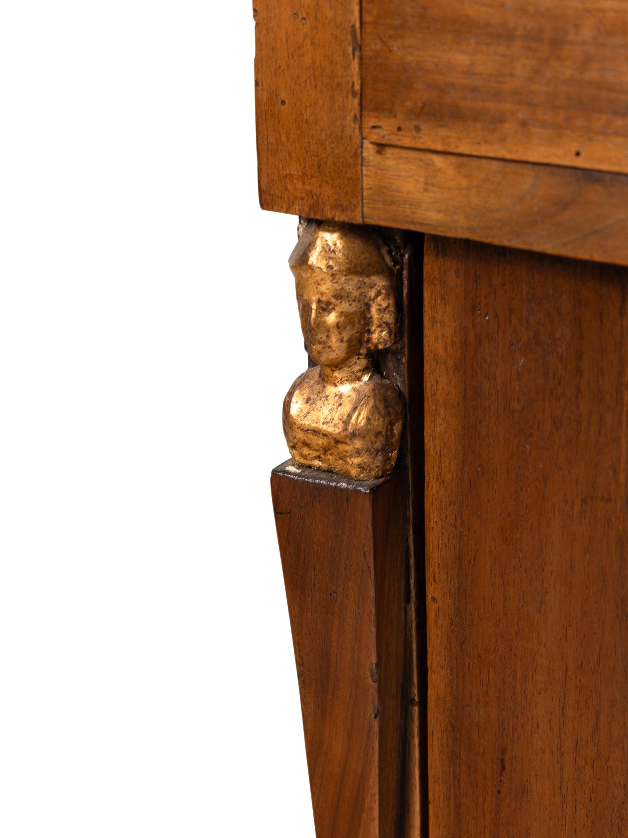 A Pair of Italian Walnut and Parcel Gilt Commodini