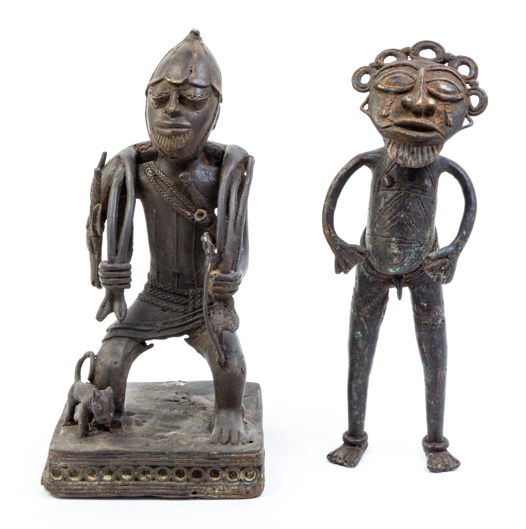 Two Cast Metal Figures Height of first 13 1/2 inches.