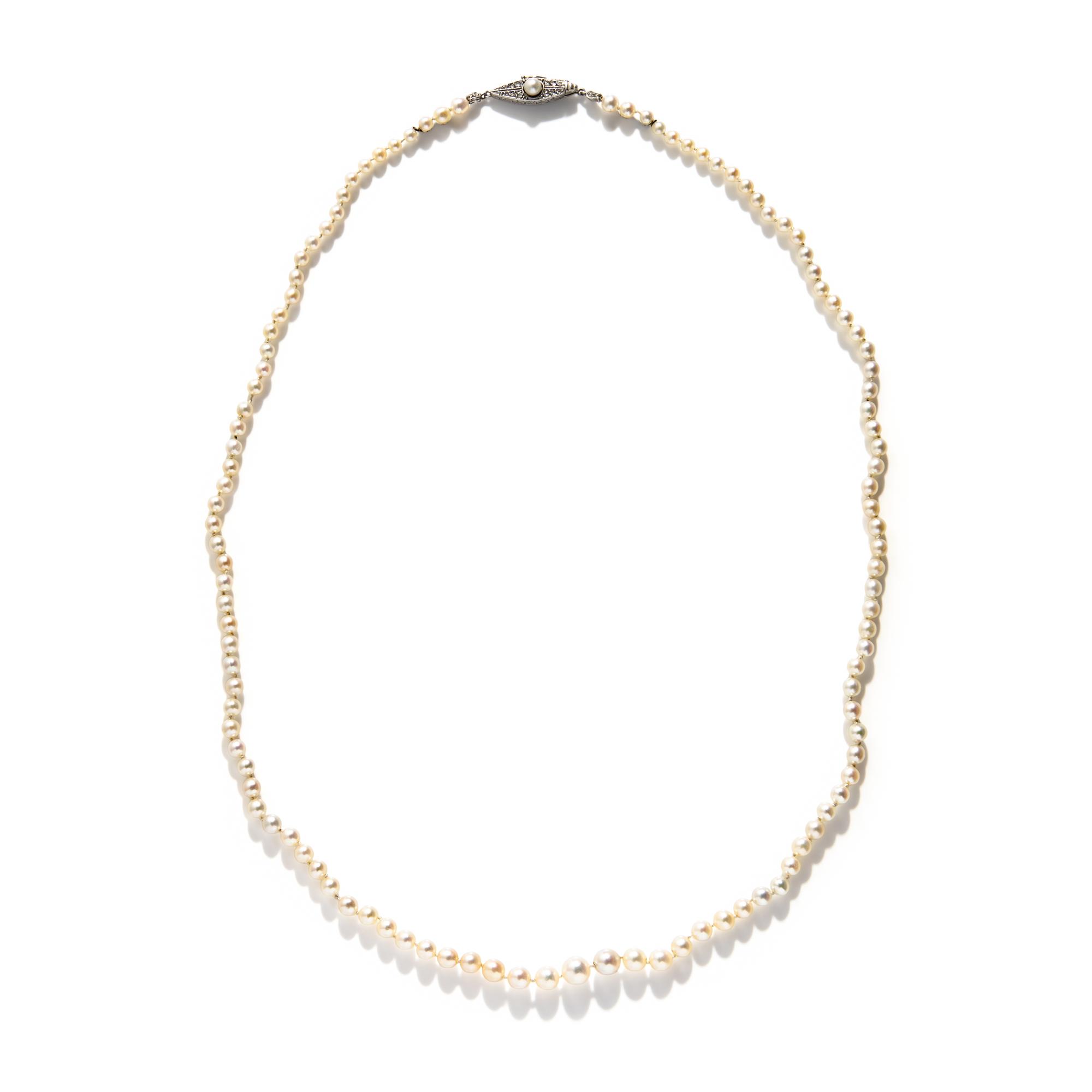 CULTURED PEARL STRAND WITH PLATINUM AND DIAMOND CLASP