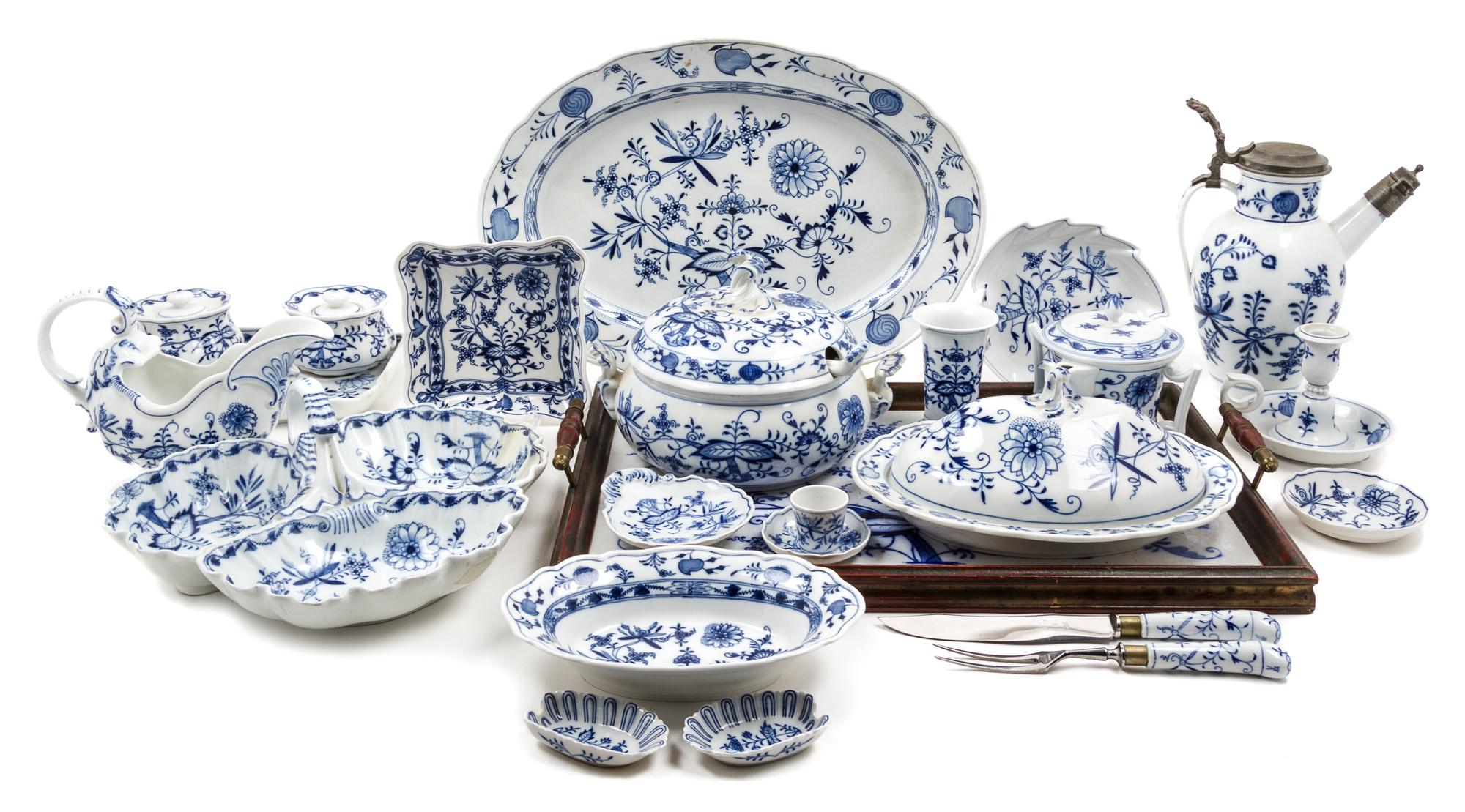 A Meissen Porcelain Blue Onion Partial Dinner Service Length of longest serving platter 24 inches.