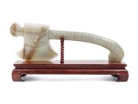 A Chinese Export Carved Jade Axe