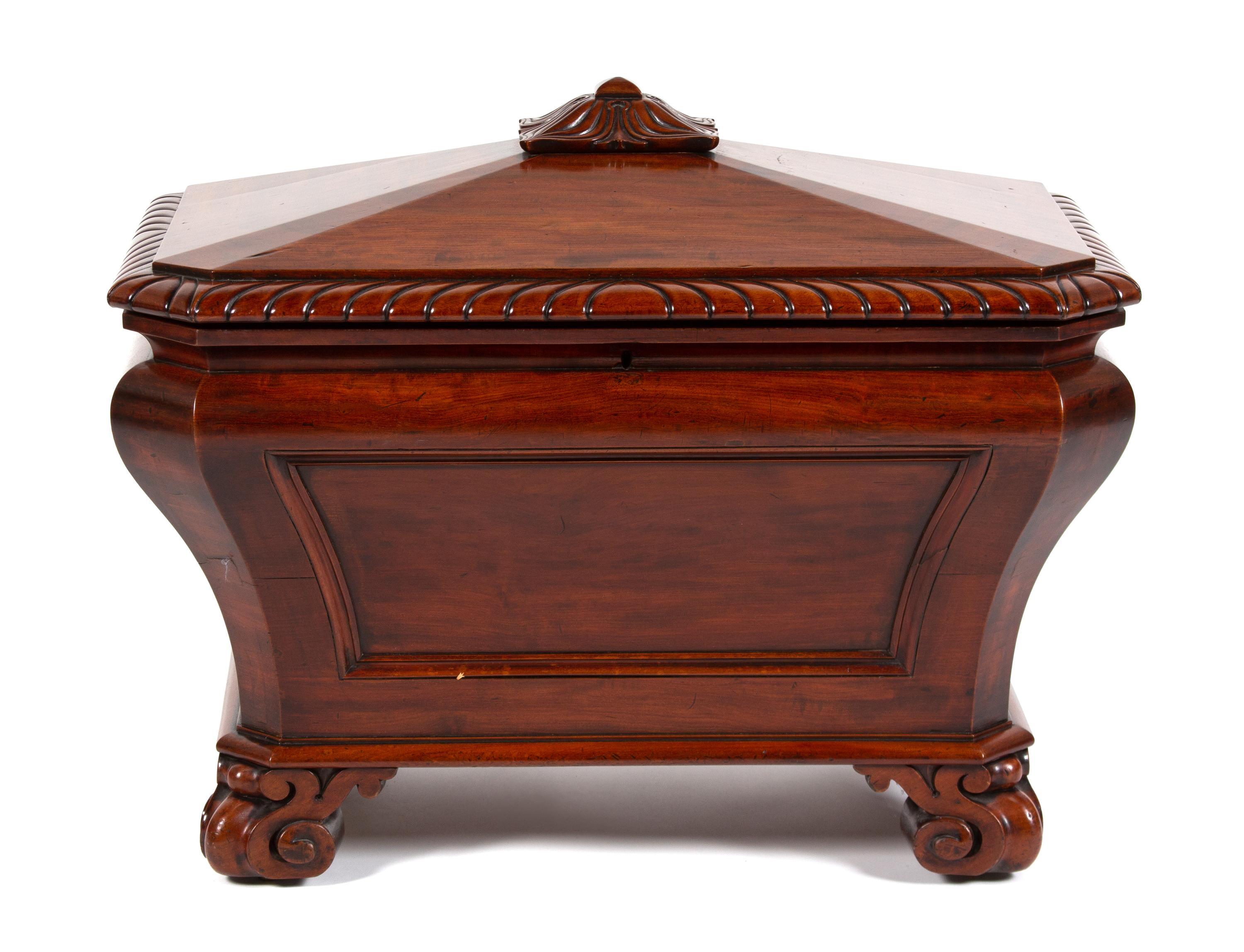 A Regency Style Carved Mahogany Cellarette Height 24 1/2 x width 30 1/2 x depth 20 1/4 inches. — 20TH CENTURY
