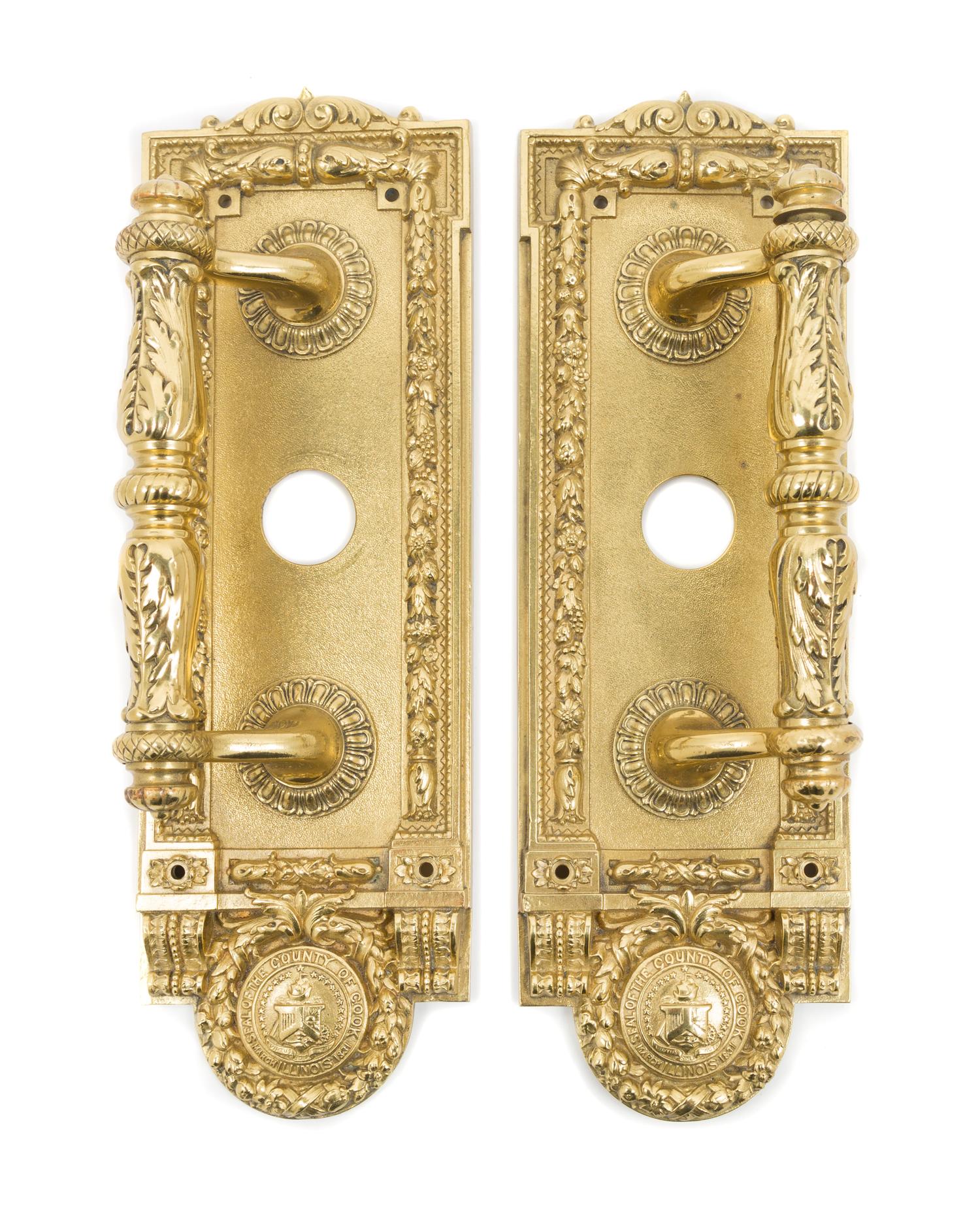 Yale & Towne Mfg. Co., EARLY 20TH CENTURY, a pair of door pulls, decorated with the seal for Cook County, Illinois