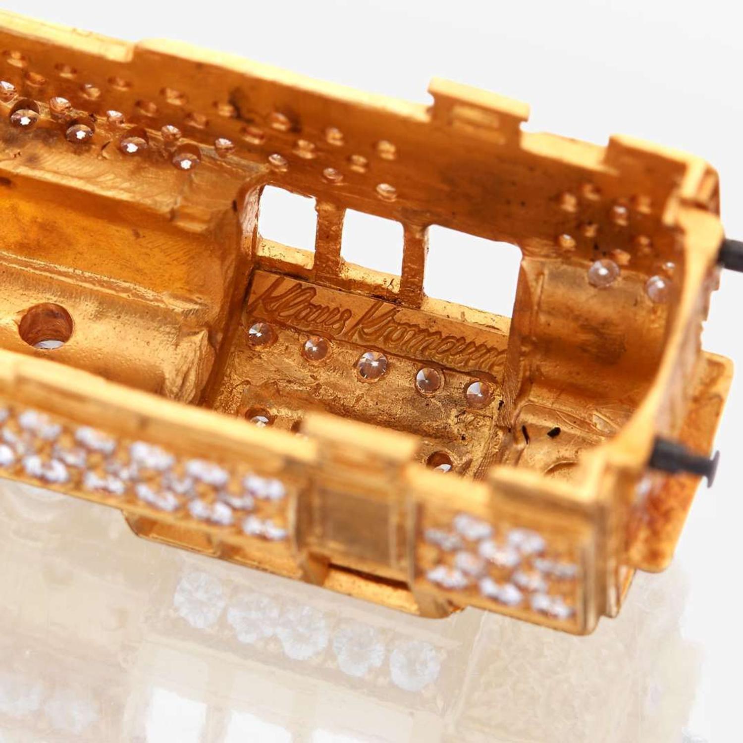 An eighteen karat gold, diamond, and synthetic gemstone model train No. 12, Halberstadt Märklin