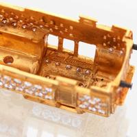 An eighteen karat gold, diamond, and synthetic gemstone model train No. 12, Halberstadt Märklin