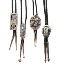 Four Southwestern Silver Bolos Height of tallest 2 1/4 x width 1 inches.