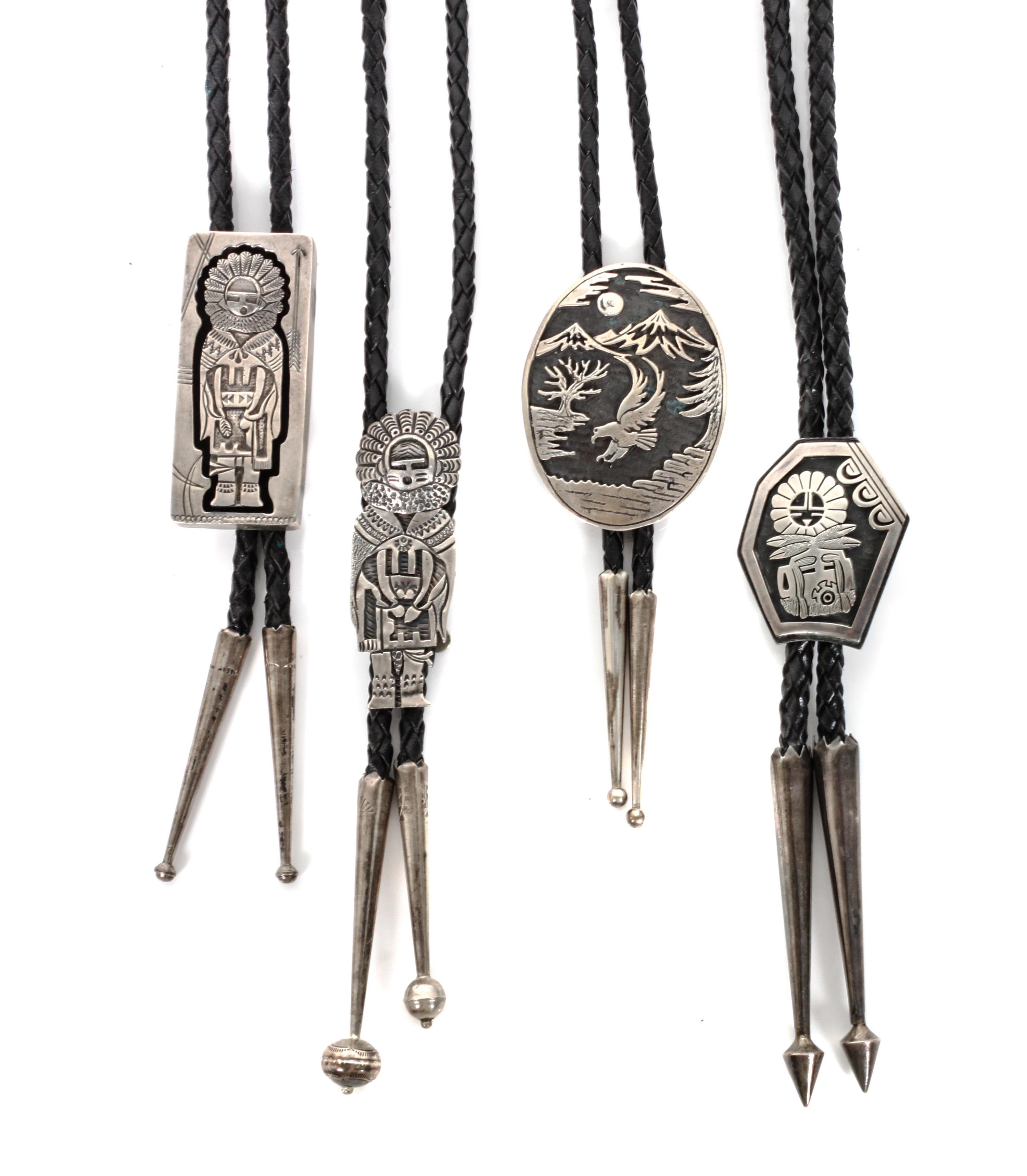 Four Southwestern Silver Bolos Height of tallest 2 1/4 x width 1 inches.