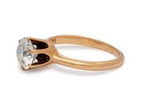 A 14 Karat Yellow Gold and Diamond Ring,